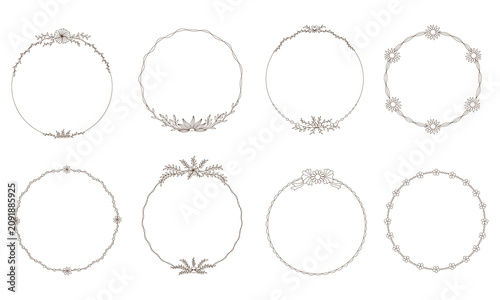 An aesthetic circular floral frame featuring brown line art on a white background in a doodle style. It is suitable for card designs, wedding card, scrapbook, digital prints, labels printing and more