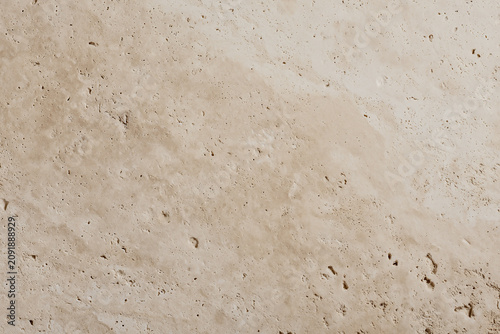 Close up of beige travertine stone texture surface background