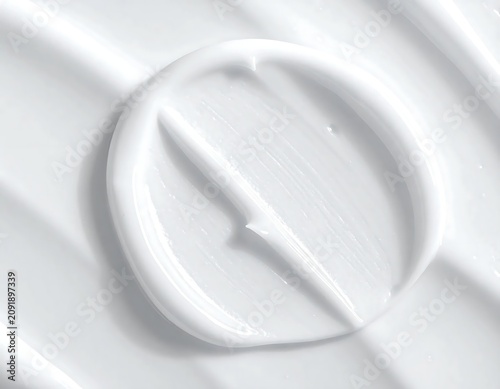 Smooth White Cosmetic Cream Swatch Spread on Minimal Background