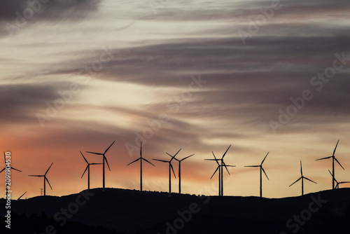 Konstfotografi Wind turbines at dawn, Sant Marc mountain range-Sierra de Benifassà, province of