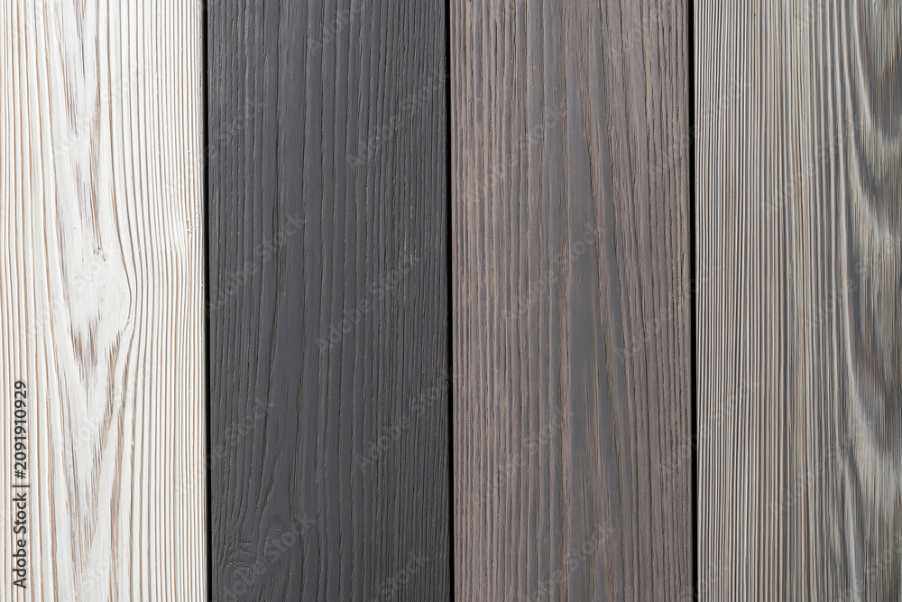 Obraz premium Assorted vertical wood planks in shades of grey and white