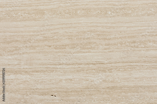 Elegant beige travertine marble stone texture background with horizontal wave lines