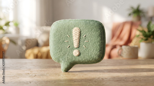 Cute Green Felt Speech Bubble with Exclamation Mark Symbol on Wooden Surface