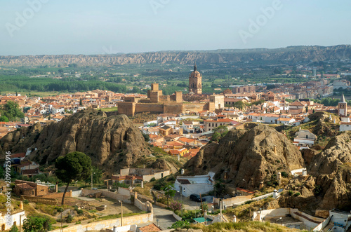 Scenic cityscape of Guadix with historic Alcazaba fortress and cathedral, Andalusia, Spain