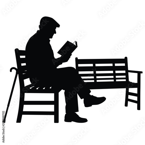 Silhouette of an elderly man sitting on a park bench reading a book