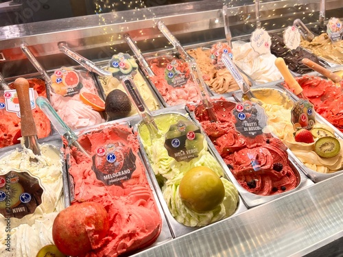 Italian authentic gelato, ice cream shop bar with different natural organic flavors.