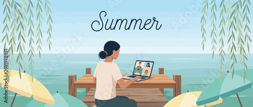 Woman working on a laptop at a seaside pier during summer
