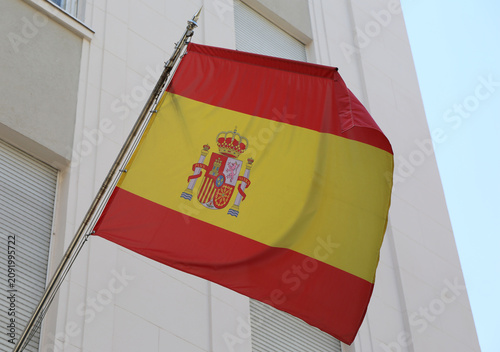 National Flag of Spain flying in the air by the building in Belgrade, Serbia