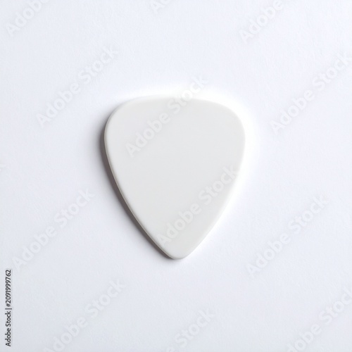 image of guitar pick on white background
