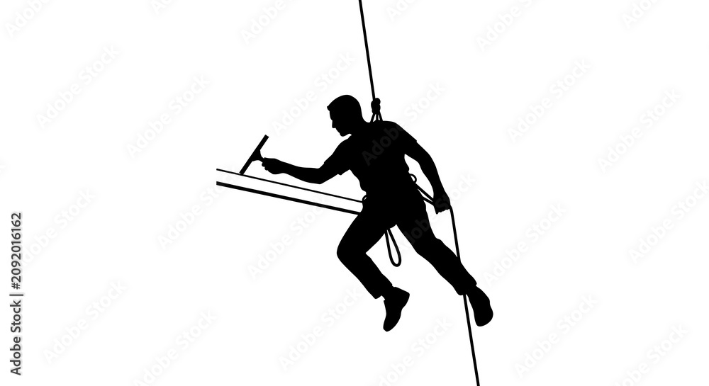 Fototapeta premium Rappelling window cleaner silhouette with rope access equipment