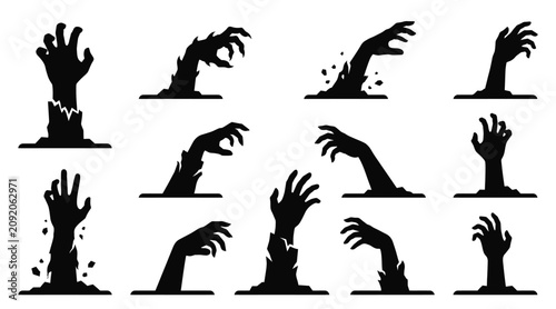 Foto Set of zombie hands rising from the ground, creepy monster arms reaching out fro