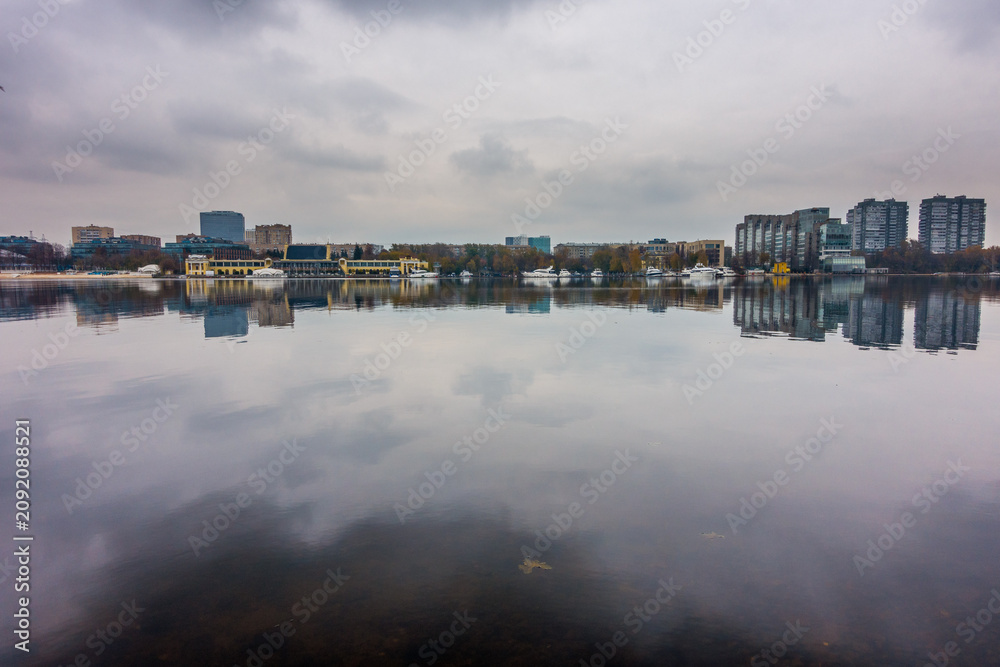 Fototapeta premium Overcast Autumn Reflection on Khimki Reservoir, Northern Moscow, Russia