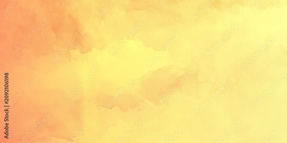 Obraz premium Soft orange and yellow watercolor paint splash background on paper. creative design projects and artistic,
