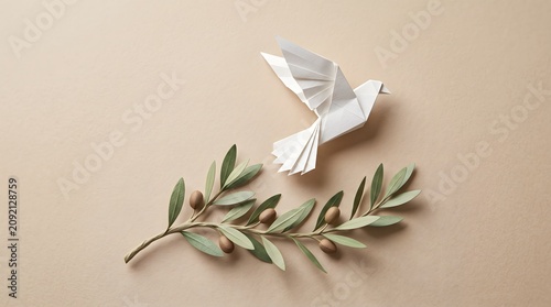 A minimalist conceptual composition featuring a white paper origami dove flying gracefully above a realistic olive branch with green leaves and small olives
