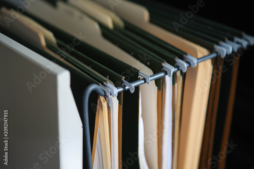 Obraz na plátně Office space file folders cabinet searching for documents, textured backgrounds