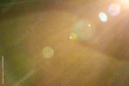 Fotografía Warm lens flare overlay with light leaks and bokeh