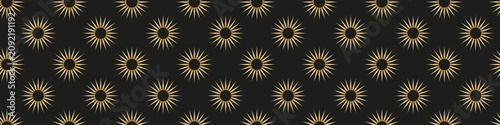 Seamless geometric sunburst pattern with bold gold ray motifs on a dark background, ideal for luxury packaging, textiles, wallpaper and branding