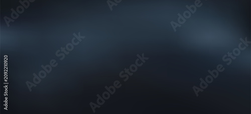 Foto A dark, almost black background with subtle gradients and soft, ethereal light streaks or wisps of light
