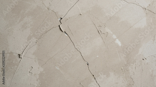 Bild auf Leinwand Cracked Concrete Surface Close Up with Textured Weathered Pattern and Shadows
