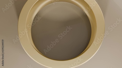 Pulling camera down revealing circular beige recessed ring on pale wall, decorative latch visible