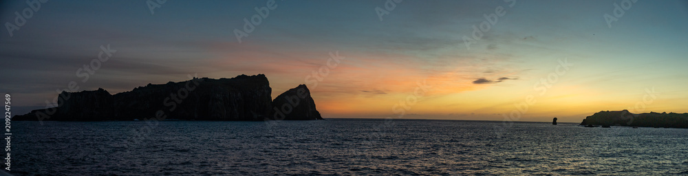 Fototapeta premium Panorama of sunrise over Nightingale Island in the South Atlantic Ocean