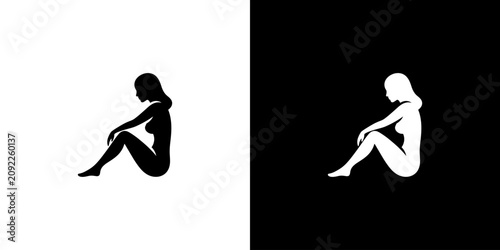 Fotografie Minimalist Black and White Silhouette of a Seated Woman Profile