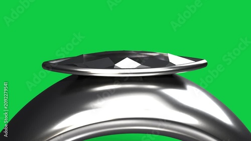 Camera pulling back revealing ring highlights moving across faces showing profile on transparent BG