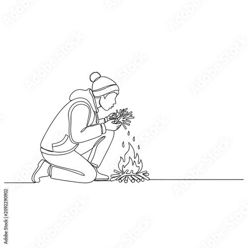 Person in winter clothes starting a campfire in minimalist line art