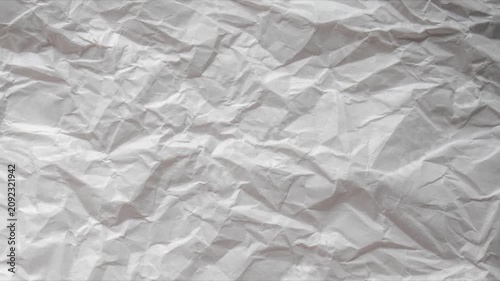 Paper texture background animated. Stop motion animated paper texture background, Crumpled paper abstract shape background with animation. white moving paper texture. Seamless looping in 4k.