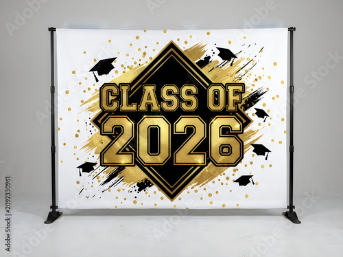 Graduation celebration backdrop featuring class of 2026 with gold and black design and caps on white background