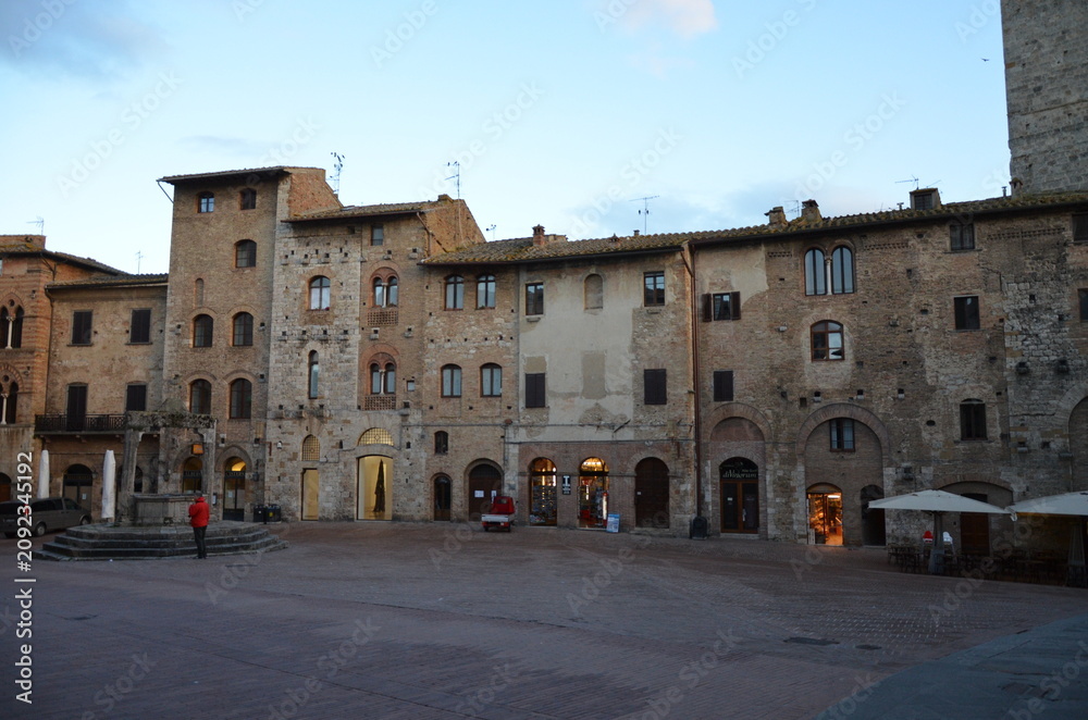 Obraz premium San Gimignano, Italy 03.04.2020: historic Piazza della Cisterna in San Gimignano
