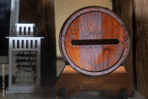 Wooden wedding card box on reception table