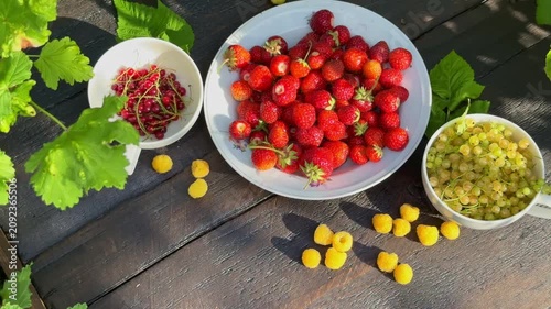 Fresh Summer Berries Assortment on Rustic Wooden Table