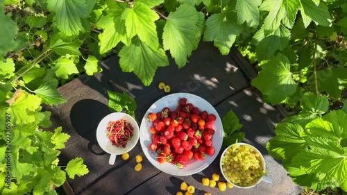 Fresh Summer Berries Assortment on Rustic Wooden Table