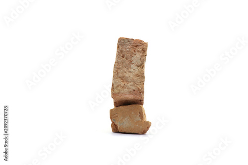 Принти на полотні Traditional bricks on a white background for wall construction.