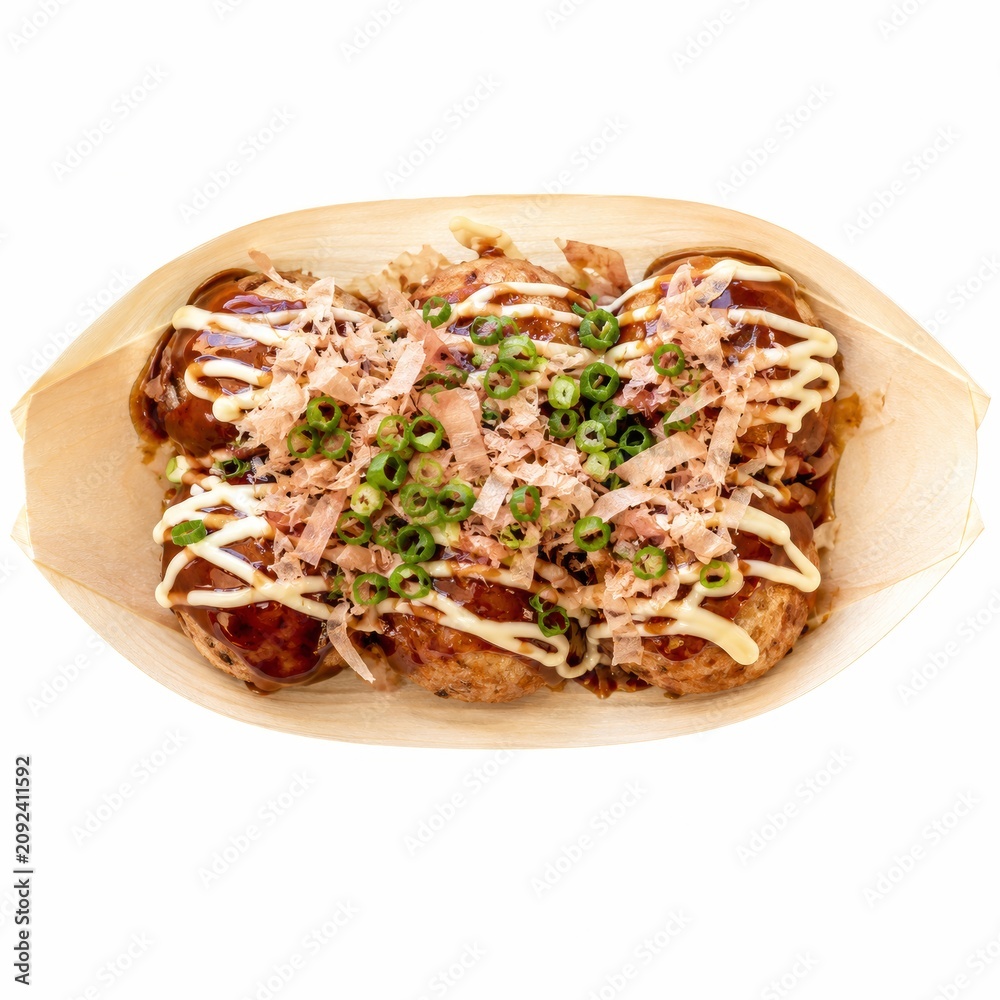 Fototapeta premium Takoyaki street food with bonito flakes and green onions isolated on white solid background
