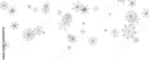 Delicate snowflakes drift a...