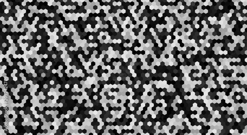 A seamless abstract background featuring a dense, repeating hexagonal tessellation. The pattern uses various shades of gray, black, and white, creating a modern, textured, and sophisticated visuals