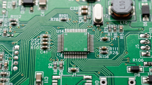 Close-up of green electronic circuit board components.