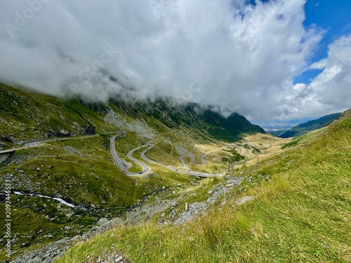 Bild auf Leinwand Spectacular view of the famous Transfagarasan mountain road winding through a lu