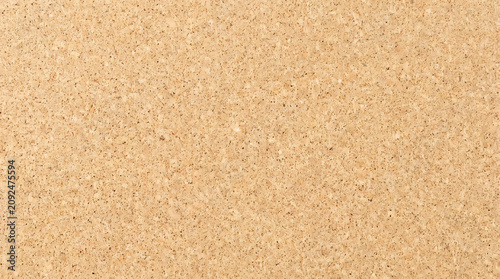 Close-up silhouette of cork surface texture, dark brown tones