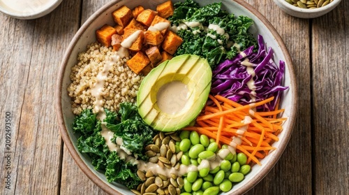 Healthy buddha bowl with avocado and fresh vegetables.