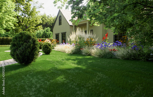 Beautiful cottage house with a blooming summer flower garden yard