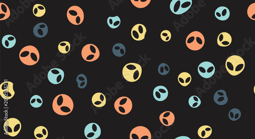 Colorful alien heads seamless pattern design featuring friendly extraterrestrial face doodles on dark gray background.