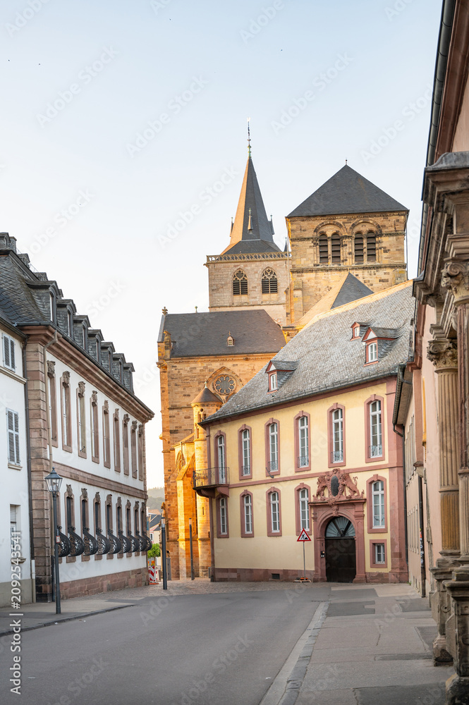 Fototapeta premium Road to High Cathedral of Saint Peter in Trier, Moselle Valley Germany, roman catholic dom, brickwork tower facade
