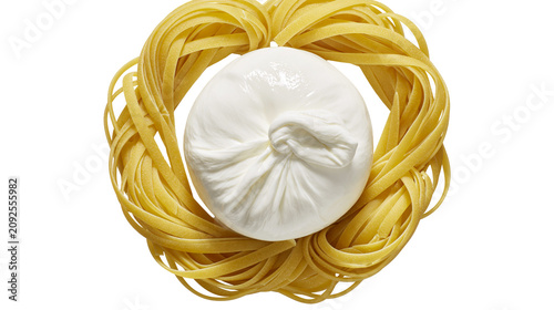 Fotografía Fresh burrata cheese ball nestled within a nest of golden fettuccine pasta, isol