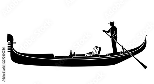 Foto Gondola with gondolier and passengers depicted as a black silhouette venetian bo