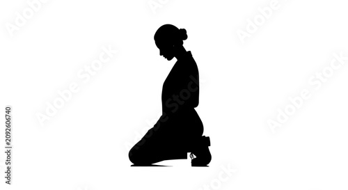 Obraz na plátně Black silhouette of woman kneeling in prayerful position isolated on white background depicting devotion and humility faith