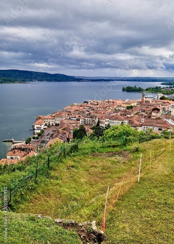 фотографія Top view from of the maggiore lake from the hill in arona, italy