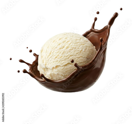 Vanilla ice cream scoop in liquid chocolate splash